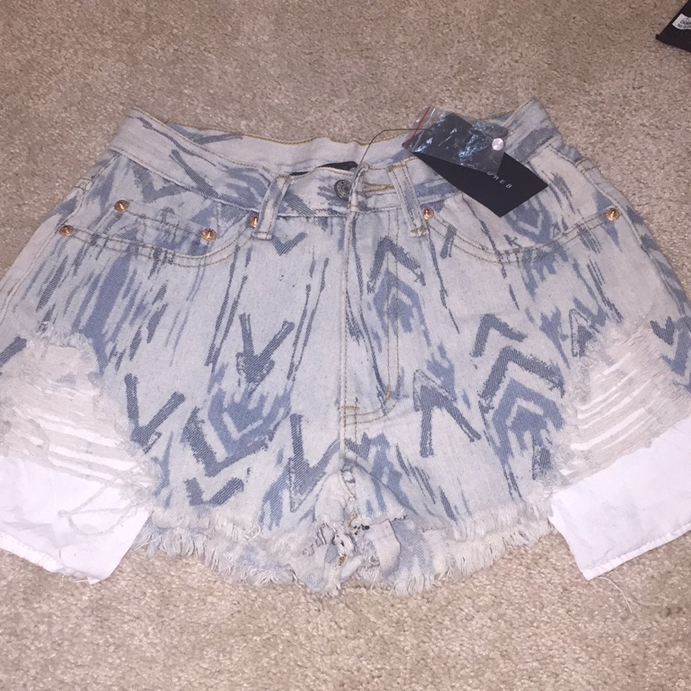 Signature 8 tribal jean shorts